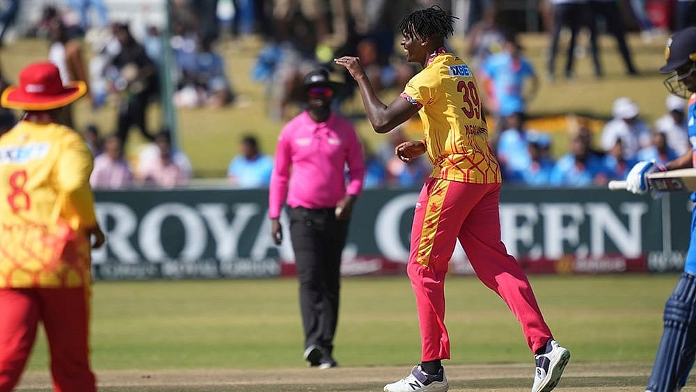 | Photo: AP/Tsvangirayi Mukwazhi : Richard Ngarava celebrates a wicket against India